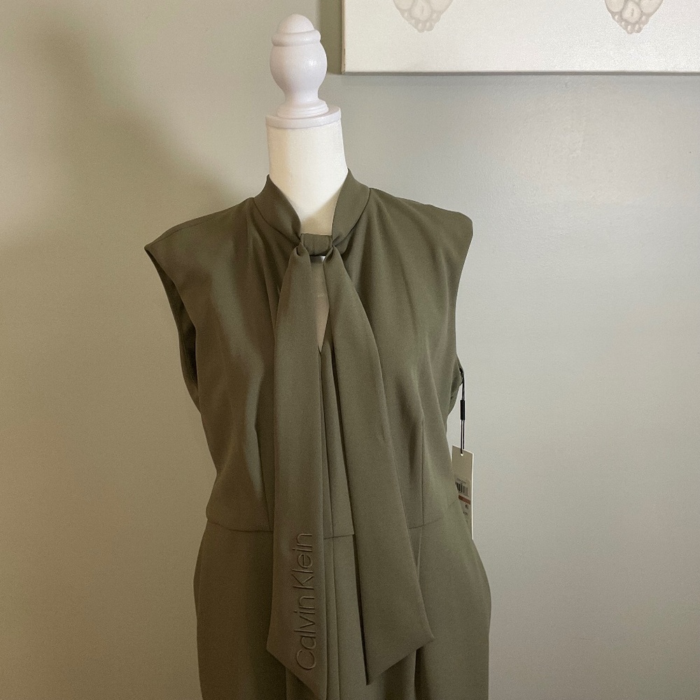 CLAVIN KLEIN; ARMY GREEN JUMPSUIT; WIDE LEG ANKLE LENGTH; SIZE 12 USA